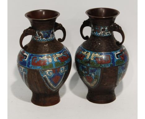 PAIR OF CHINESE CLOISONNE AND PATINATED METAL TWO HANDLED VASES, each of baluster form, with mask capped scroll handles to th