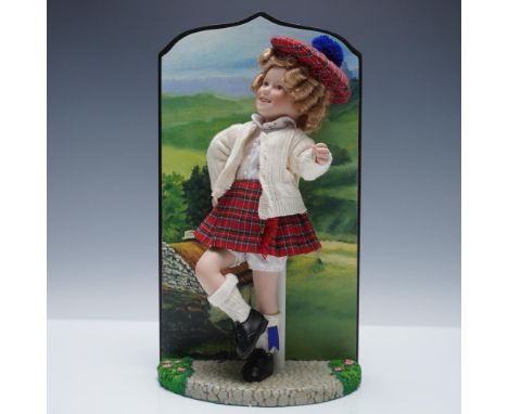 This Shirley Temple doll is part of the Shirley Temple Movie Classics series. The figure is portrayed in a Scottish-themed co