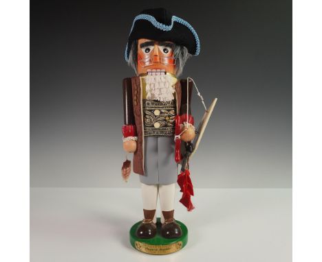 This handcrafted wooden nutcracker by Steinbach Volkskunst depicts one of America's Founding Fathers, Benjamin Franklin. Made