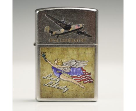 This Zippo lighter showcases a WWII inspired aviation motif, featuring a B-24 Liberator bomber illustration and a vibrant Lad