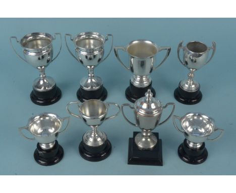 Eight various silver plated trophy cups