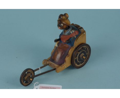 Japanese Meiji period Kobe wooden articulated automaton figure in a rickshaw, neck raises up and hand waves fan, with Japanes