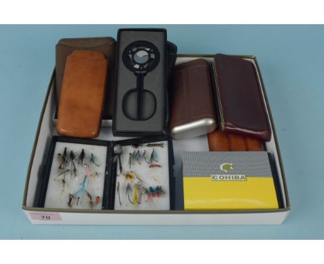 Six vintage leather cigar cases, a boxed Cuban Crafters cigar cutter, a Cohiba lighter and a small box of assorted trout fish