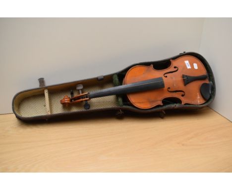 A vintage violin bearing inner label reading 'Copy of Andreas Amati-made in Czecho-Slovakia'.