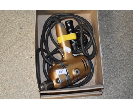 A vintage Black &amp; Decker D700 electric drill.