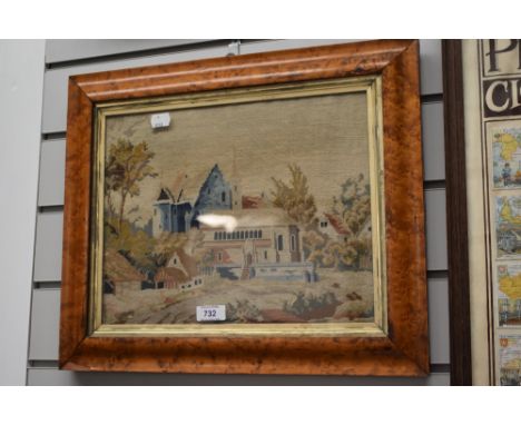 A tapestry depicting a priory/castle.