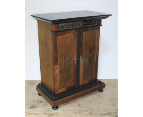 A late 19th century table cabinet polyphon music player, 'The Imperial', with one disc, width 43cm, depth 25cm & height 55cm.