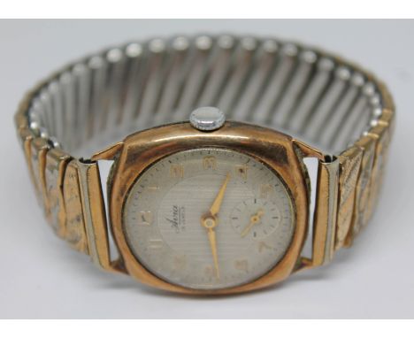 A vintage hallmarked 9ct gold Aria 15 jewel manual wind wristwatch with signed guilloche dial, Arabic numerals and hands in g