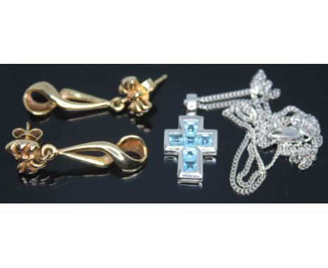 A pair of drop earrings, length 31mm, each with 9ct gold import marks, together with a crucifix pendant set with six light bl