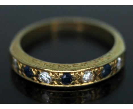 A hallmarked 18ct gold diamond and sapphire half eternity ring, gross wt. 3.03g, size K.  Condition - good, no damage/repair,