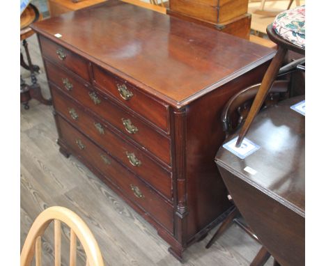 A Georgian mahogany chest of drawers, the two upper drawers over three graduated lower drawers flanked by quarter fluted edge