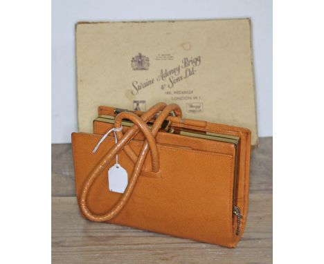 A ladies vintage leather clutch horse racing bag by Swaine, Adeney, Brigg &amp; Sons Ltd, in original box.  Condition: very g