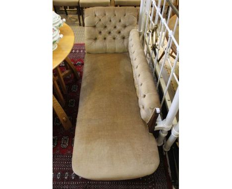 A Edwardian single end chaise lounge all over mushroom velour with button back.
