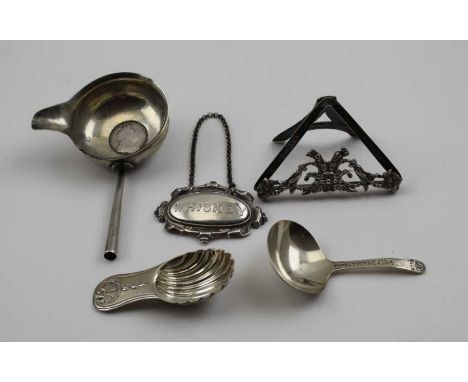 A George III silver caddy spoon, bright cut decoration to the handle, plain bowl, London 1800, together with a silver "Whiske