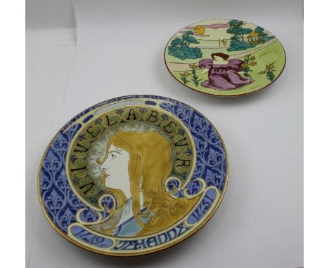 A Lunville Art Nouveau pottery charger, painted and gilded with the profile portrait of a young woman, inscribed "Vivelabeur 