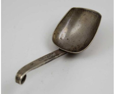 A Russian silver caddy spoon, scroll tip handle, chased decoration, bears "84" mark, together with&nbsp;A cased EPNS egg set,