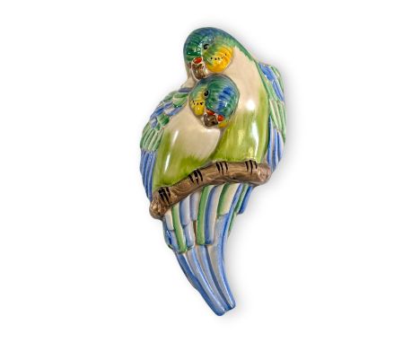 A Clarice Cliff 'Budgerigar' wall pocket, circa 1930s, in the form of two vividly coloured budgies perched on a branch  21.5c
