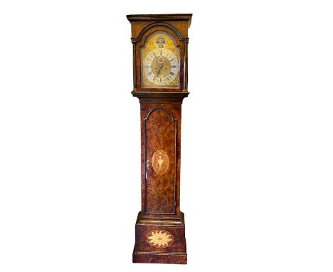 An 18th century and later burr walnut 8 day longcase clock with a 12" arched brass dial with secondary dial, calendar, strike