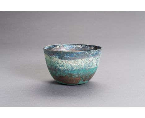 A CHINESE BRONZE BOWL, HANChina, Han Dynasty (206 BC - 220 AD). The simplistic bowl shows beautiful naturally grown malachite