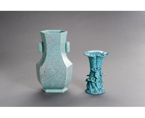 A PAIR OF ROBIN'S-EGG GLAZED VASESChina, 20th century. Consisting of a hexagonal vase in Hu shape with a pair of tubular hand