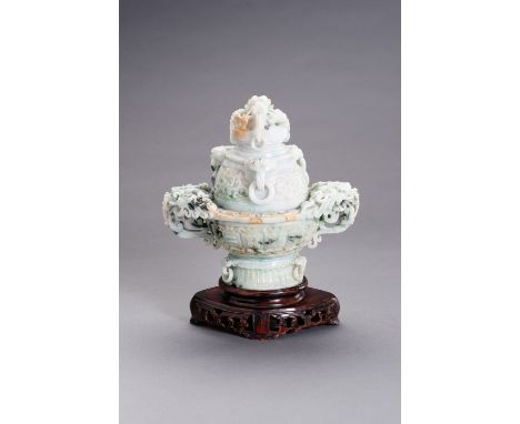 A FINE JADEITE CENSER AND COVER WITH DRAGONSChina, 20th century. The censer and cover show impressive relief carving, the thi