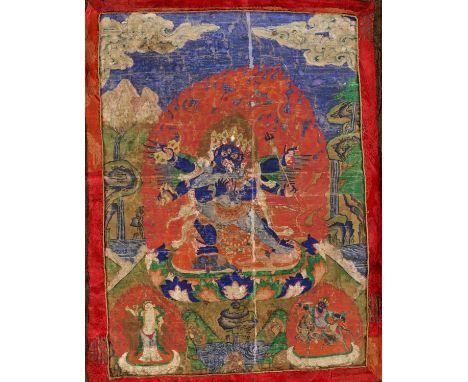 A THANGKA OF GURU DRAGPO, 17TH-18TH CENTURYTibetan-Chinese 17th to 18th century. Distemper and gold color on cloth. The centr