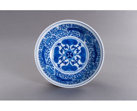A FAMILLE VERTE ENAMELED PORCELAIN 'LOTUS AND PEONY' BOWLChina, 20th century. Painted in bright enamels to the exterior sides