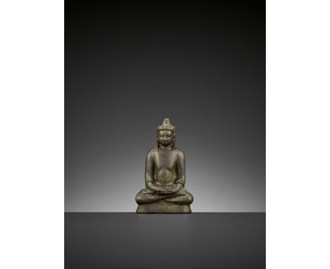 A BRONZE FIGURE OF BUDDHA, MON-DVARAVATIThailand, 9th century. Seated in dhyanasana with the hands lowered in dhyanamudra, th