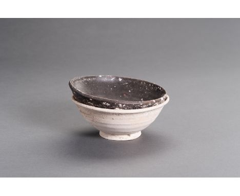 TWO MELTED TOGETHER CERAMIC SHIPWRECK BOWLSChina, Han to Ming Dynasty (206 BC - 1644). Of simplistic design, the bowl underne