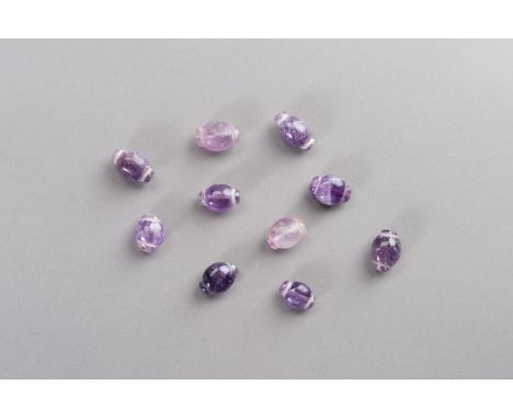 A FINE LOT WITH TEN ANCIENT AMETHYST BEADSSamon Valley culture, 800 BC - 200 AD. A charming lot with ten beads in a rare barr