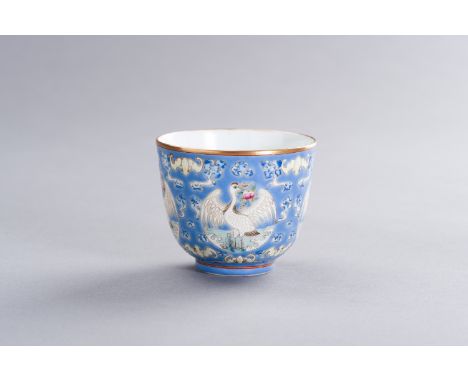 A FALANGCAI ENAMELED PORCELAIN 'CRANES AND BATS' CUPChina, 20th century. The deep rounded sides painted on the exterior in th