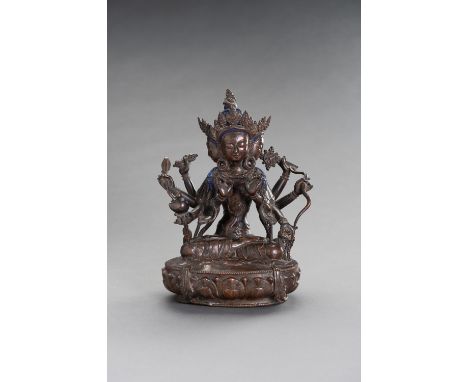 A COPPER ALLOY BRONZE FIGURE OF PRATISARATibet or Nepal, 1900-1930. The copper alloy bronze figure of Pratisara with blue and