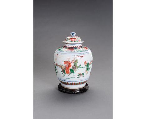 A WUCAI ENAMELED PORCELAIN JAR AND COVER, MING DYNASTYChina, Ming dynasty (1368-1644). The ovoid body rising from a tapered f