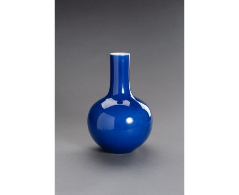 A SACRIFICAL BLUE GLAZED PORCELAIN TIANQIUPING VASE, LATE QINGChina, late Qing dynasty (1644-1912). Thickly potted with a tal
