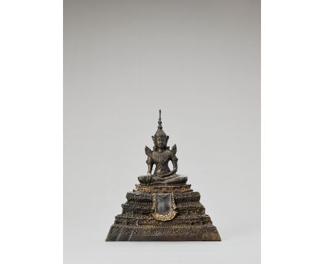 A THAI GILT BRONZE FIGURE OF BUDDHA SHAKYAMUNI, RATTANAKOSINThailand, 1732-1932. Seated in dhyanasana on an elaborate stepped