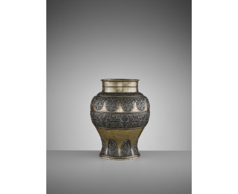 AN ARCHAISTIC BRONZE BALUSTER VASE, 17TH CENTURYChina, late Ming to early Qing dynasty. Heavily cast, the shoulder incised wi
