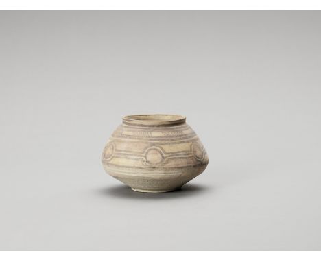 POLYCHROME NAL WARE CERAMIC POTIndus Valley, Pakistan, Nal culture (around 3100-2700 BCE). A biconical ceramic pot with polyc