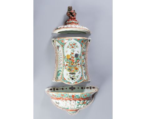 A FAMILLE ROSE PORCELAIN CISTERN WITH COVER AND BASINChina, late Qing Dynasty (1644-1912). The flat-backed cistern of pear sh