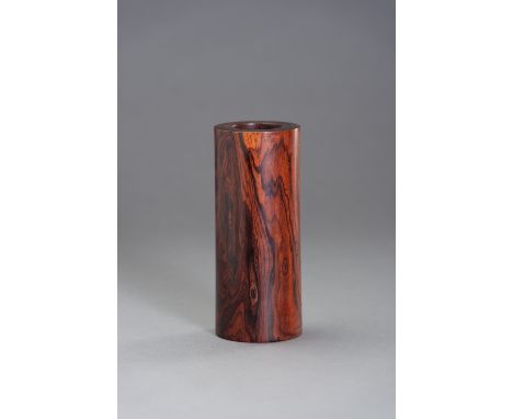 A HEAVY ROSEWOOD BRUSHPOTChina, 20th century. Of smooth cylindrical form, the wood is of a light reddish-brown tone with natu