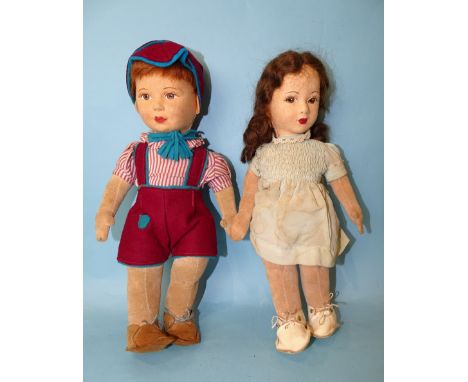 A Chad Valley girl doll with pressed felt face, painted features, brown mohair, original light blue smocked dress, felt limbs