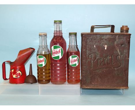 A vintage Pratts petrol can, an Esso pint oil can, a glass Castrol XXL 40 bottle, a glass Castrol XL 30 bottle and one other,