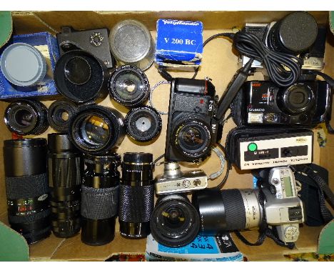 A mixed lot of cameras, lenses and accessories: cameras by Minolta, Dynax 4 with manual and pocket Autopak 50, Nikon F-301, O