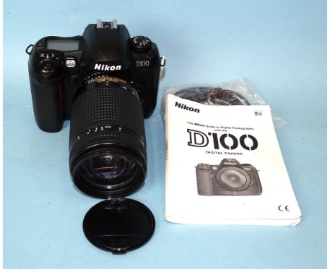 A Nikon D100 DSLR camera no.2113969, with AF Nikkor 70-300mm f4-5.6D lens, maker's manual and USB cable. 