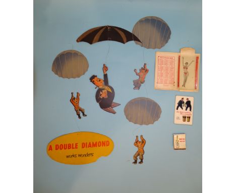 Advertising, a "Double Diamond Works Wonders" card mobile, a "Guinness Is Good For You" 1956 calendar card, a risqué calendar