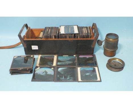 A collection of eighty-one glass magic lantern slides, (some tinted), of European scenes, including some railways, and a lens