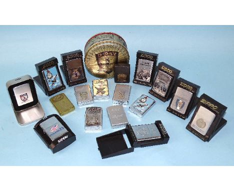 A D-Day Normandy 50 Years 1944-1994 lighter in presentation tin, one other D-Day 1994-2004 lighter, The Battle of Britain 194