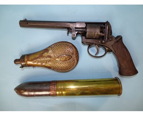 A replica percussion pistol, a copper embossed powder flask and a 2'' artillery shell dated 1942, (3). 