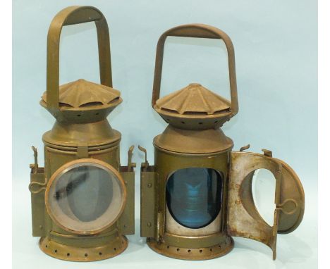 A WW military green-painted three-aspect railway lamp with applied label, stamped Wakefields, Birmingham 1945 and another, no