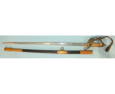 An 1827 pattern naval officer's sword and scabbard, the 79cm blade with etched decoration, the guard with folding catch and s