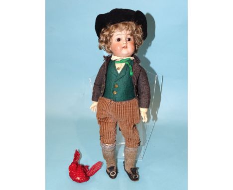 A Simon Halbig/Kammer &amp; Reinhardt 36 bisque head boy doll with sleeping brown eyes, open mouth with upper teeth, brown cu